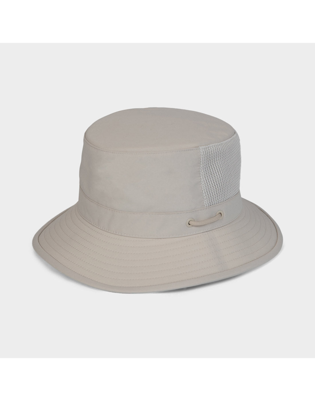 Tilley LTM1 Airflo® Bucket Hat in light beige with mesh panel, T1 silhouette, shown on white background.