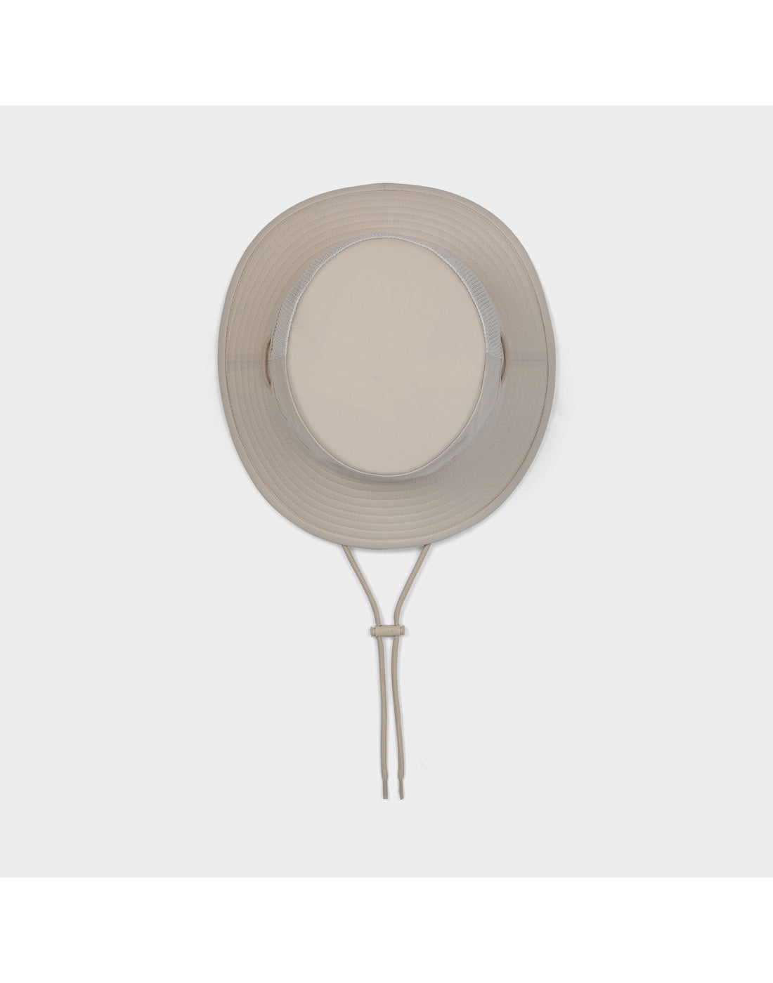 Tilley LTM1 Airflo® Bucket Hat in beige with adjustable chin strap, shown on a white background.