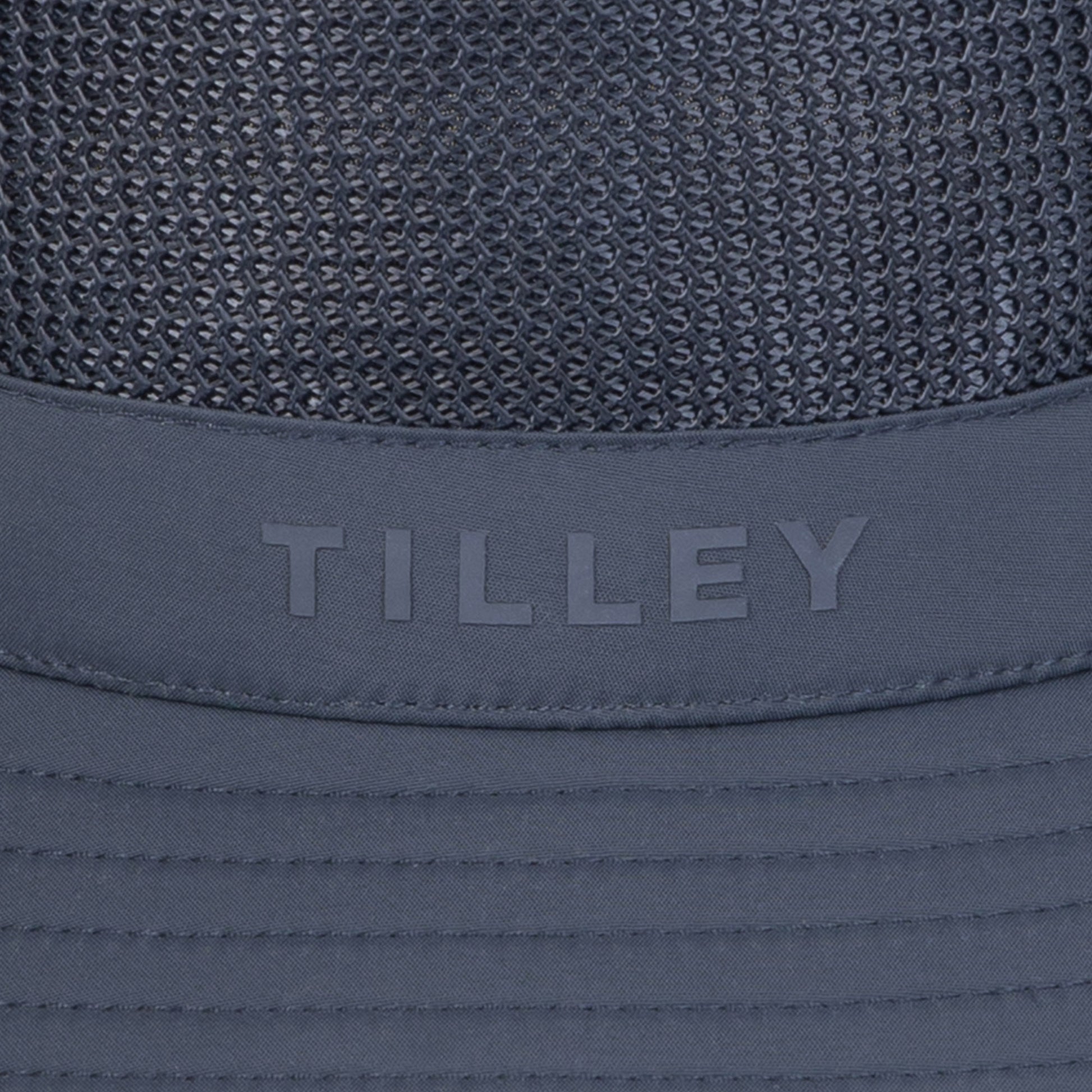 Close-up of a navy Tilley LTM1 Airflo® Bucket Hat with mesh panels for breathability.