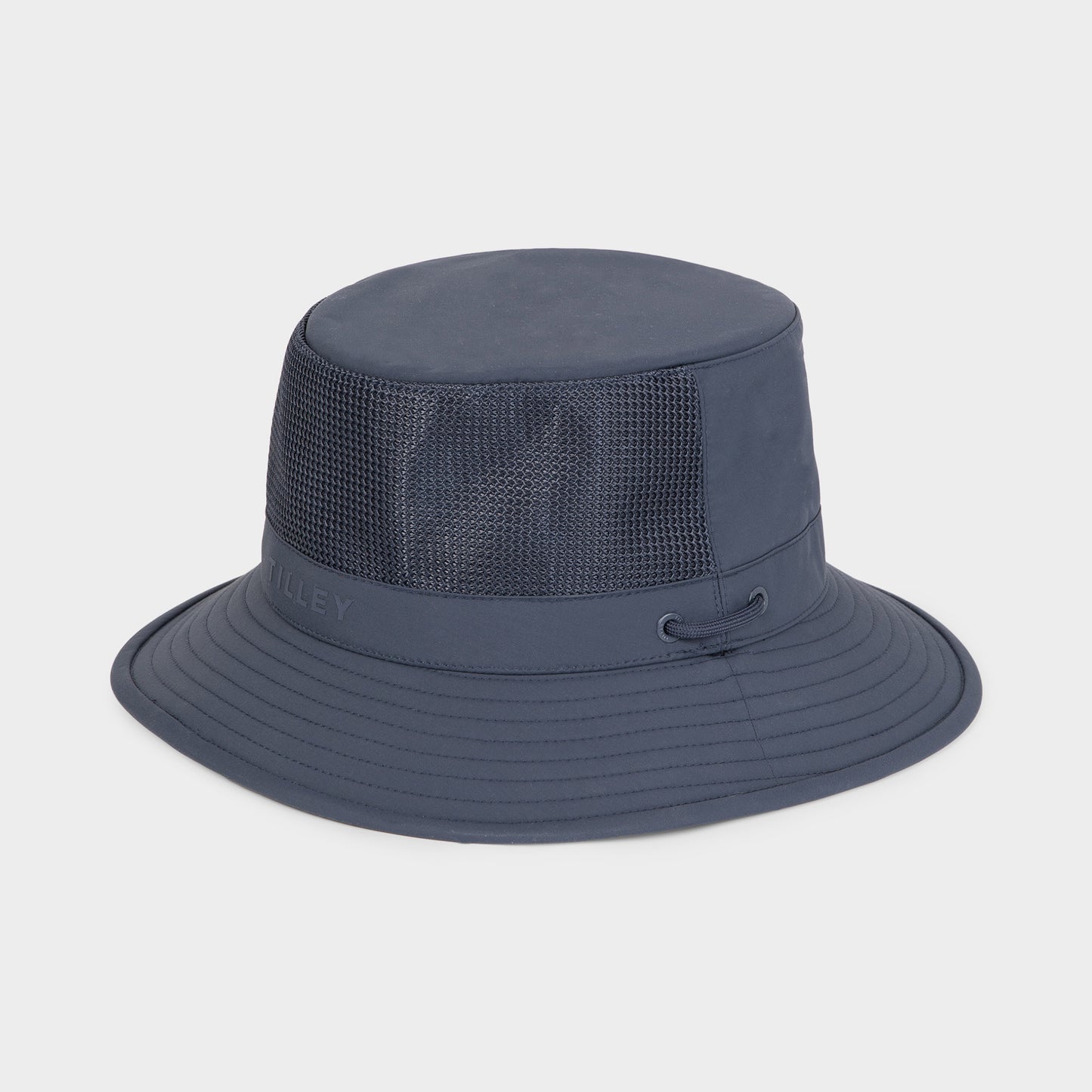 The Tilley LTM1 Airflo® Bucket Hat in navy blue features mesh ventilation and a wide brim, shown on plain background.