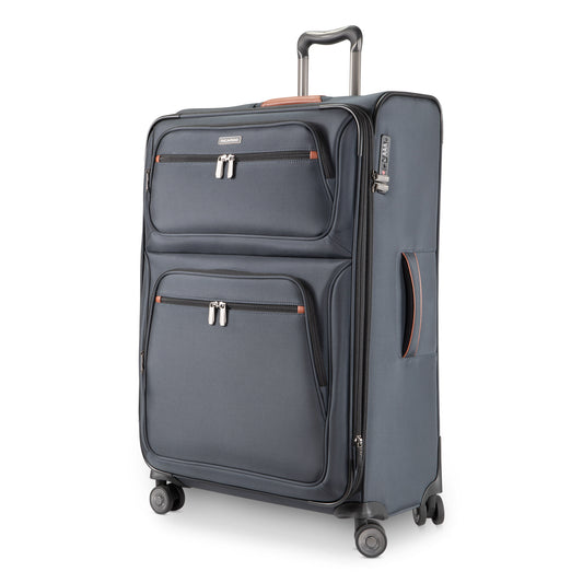 Product Image – Ricardo Beverly Hills Montecito 3.0 large black expandable spinner with two zip pockets and telescopic handle.