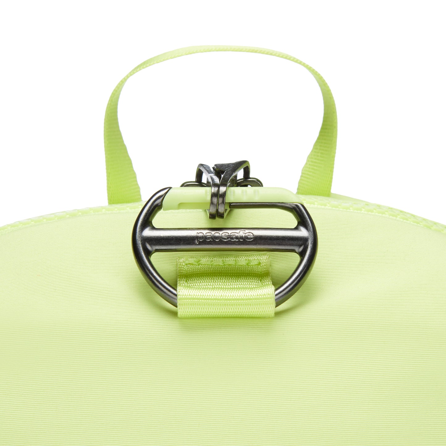 Close-up of Pacsafe® CX Anti-theft 8L Backpack Petite in matcha green nylon with a metallic buckle and handle.