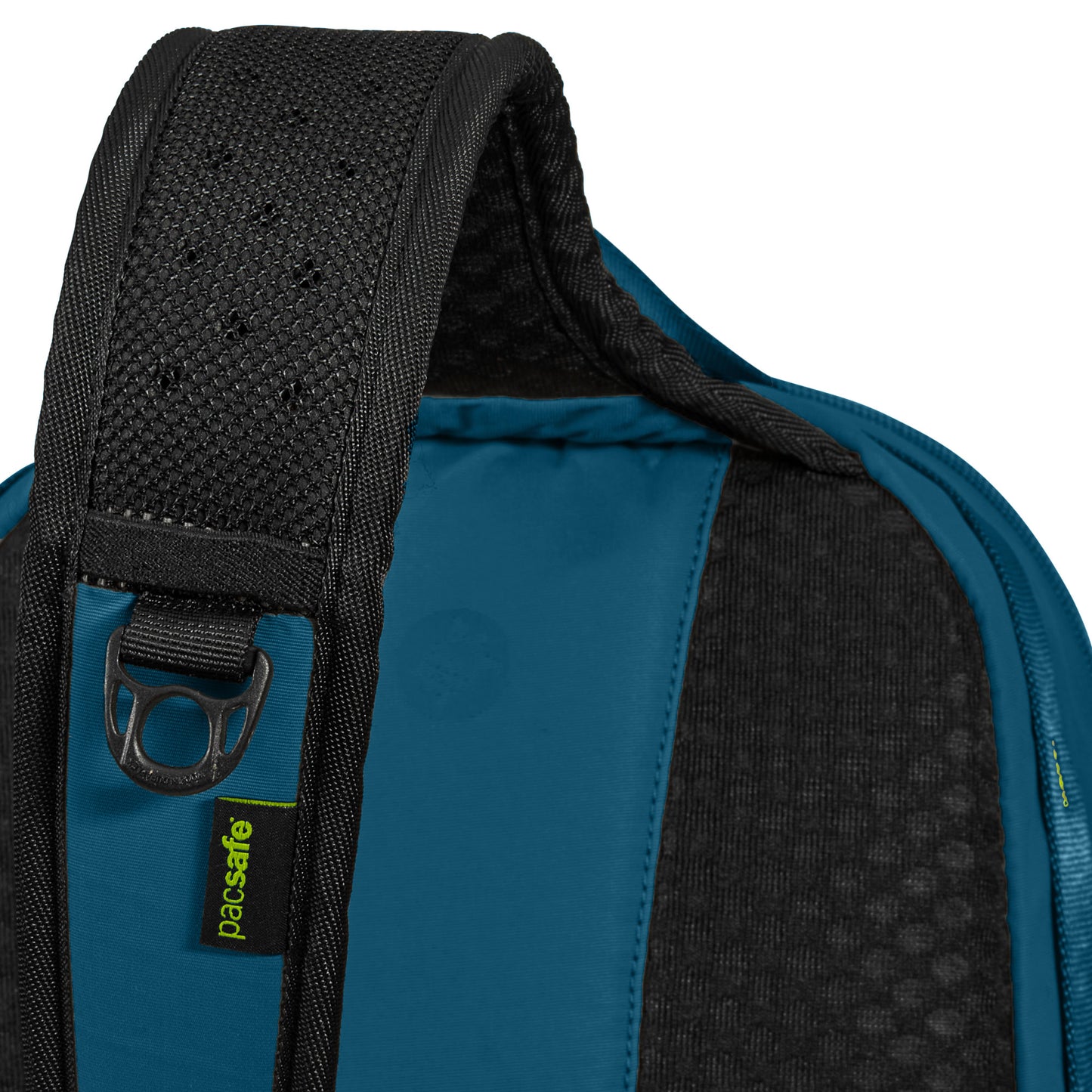Close-up of the Pacsafe® ECO 12L Sling Backpack in teal, featuring adjustable black straps and brand tag.