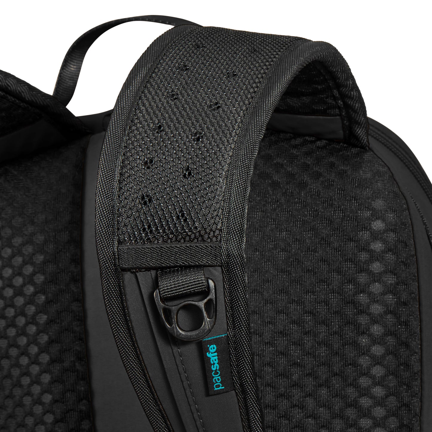 Close-up of Pacsafe® ECO 18L Anti-theft Backpack's black strap with recycled materials, mesh padding & small metal loop.