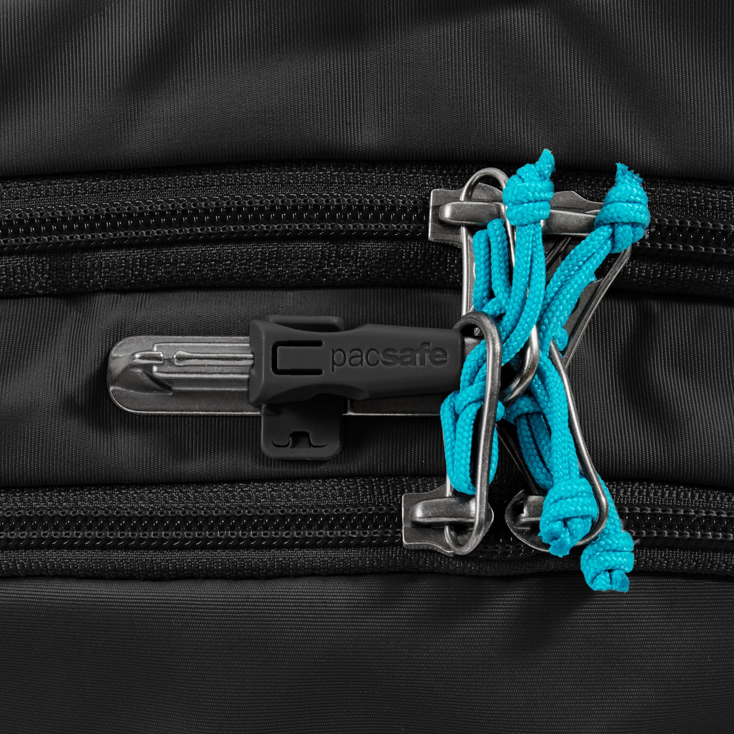 The Pacsafe® ECO 25L Backpack features metal latches, a black zipper lock, and turquoise rope ties for security.