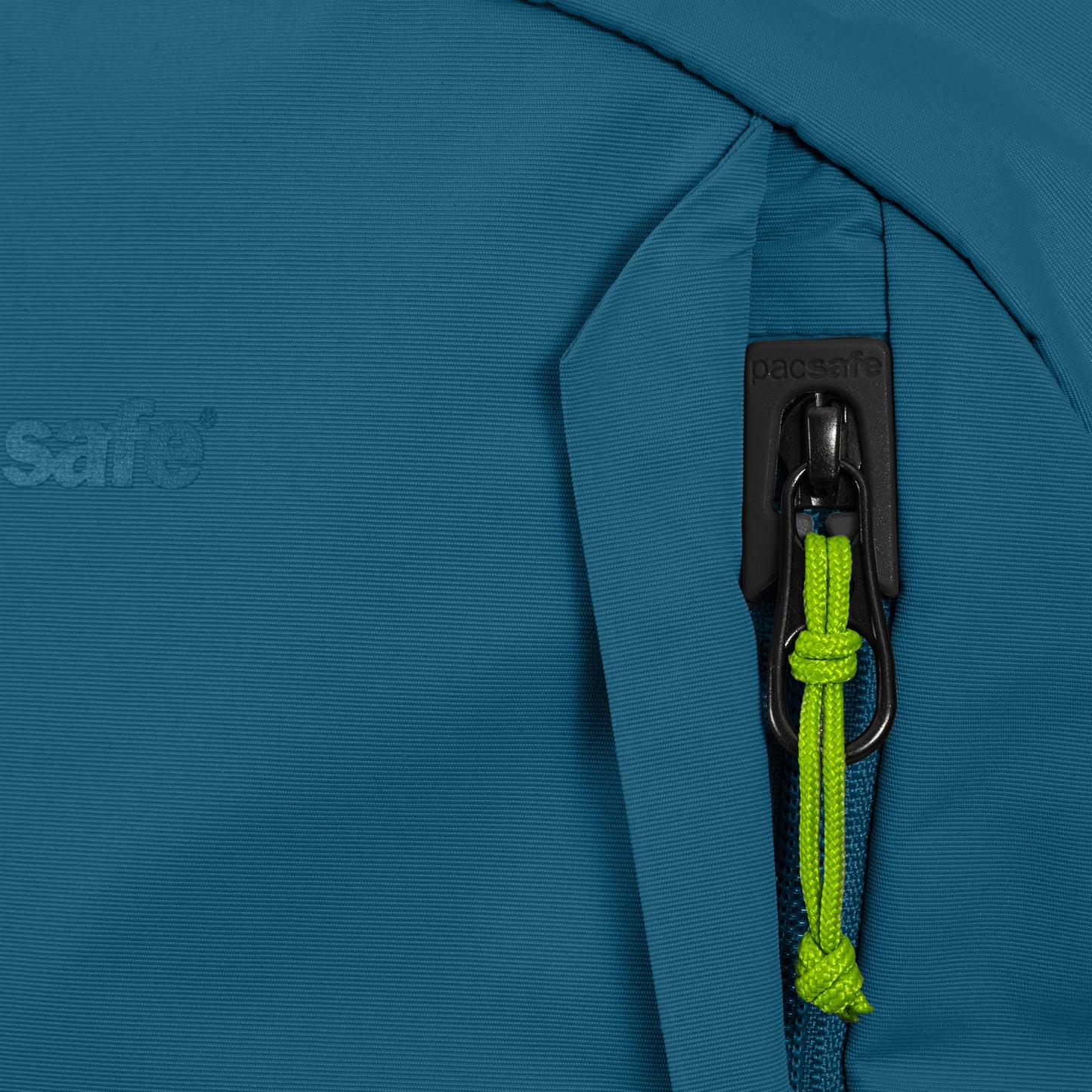 Close-up of the teal Pacsafe® ECO 25L backpack, highlighting its sustainable fabric, zipper, and stitching.
