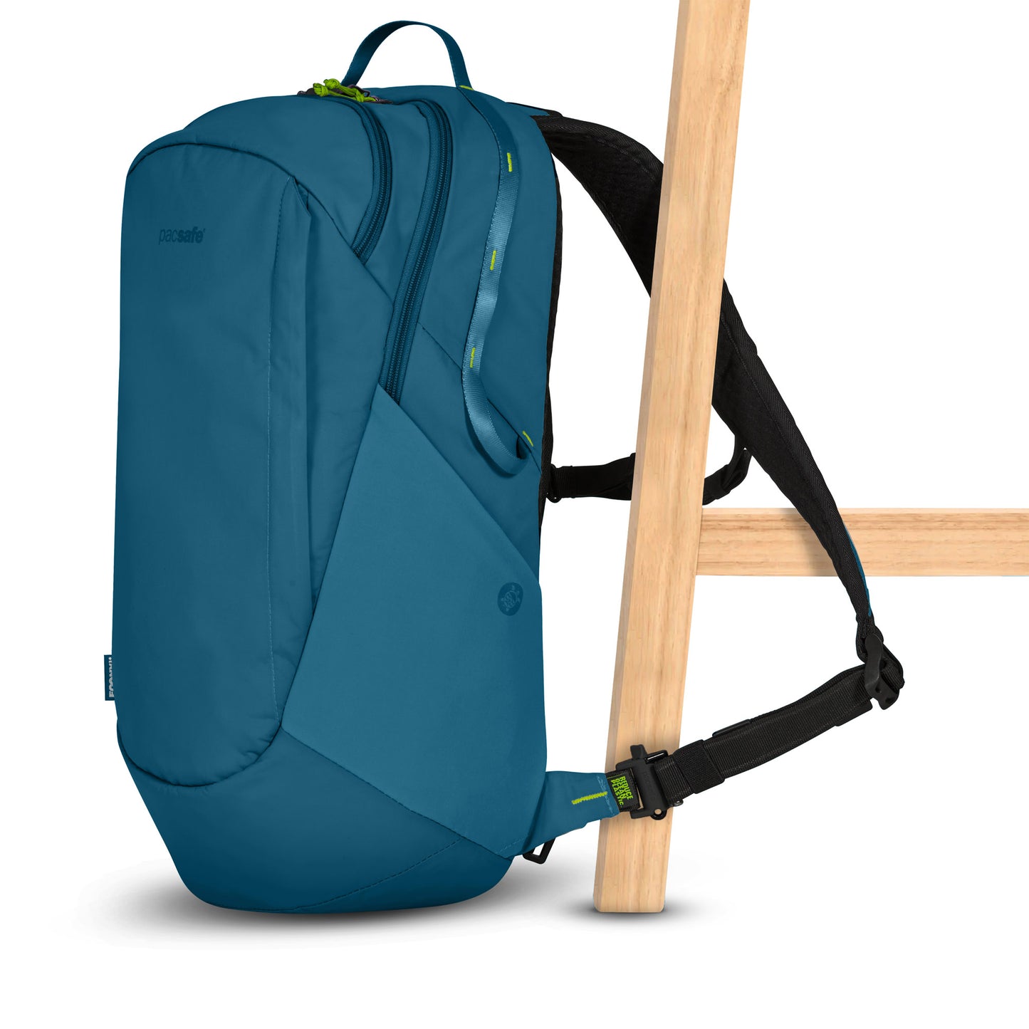 The Pacsafe® ECO 25L Anti-theft Backpack, made from recycled materials, is strapped to a wooden chair.