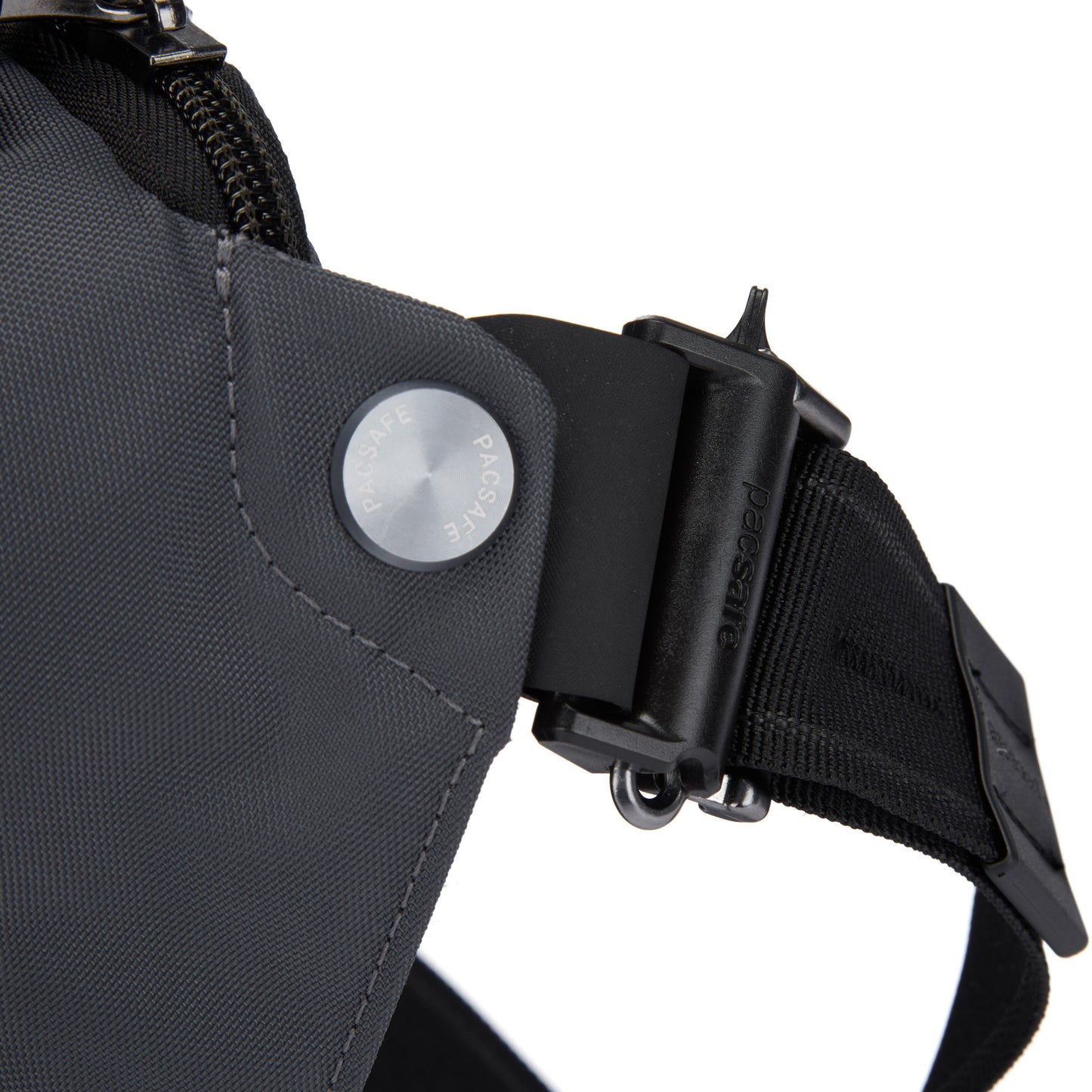 Close up of side strap on slate Pacsafe® EXP 12 Anti-theft Sling Crossbody