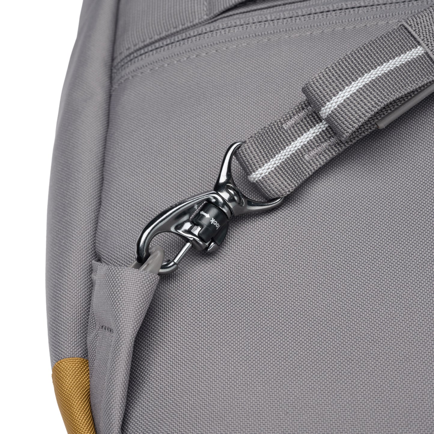 Close up of turn n lock clip on backpack strap