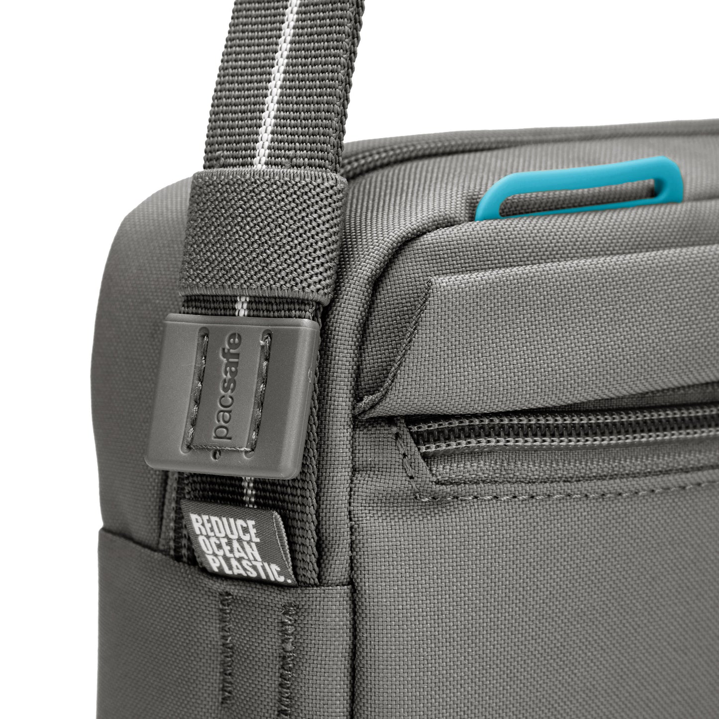 Close up of adjustable crossbody strap on stone Pacsafe® GO Anti-Theft Crossbody Bag