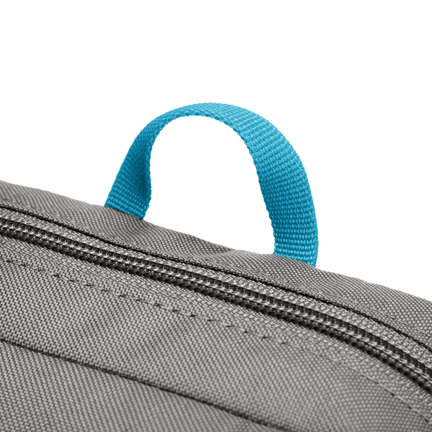 Close up of turquoise top loop on the stone Pacsafe® GO Anti-Theft Festival Crossbody