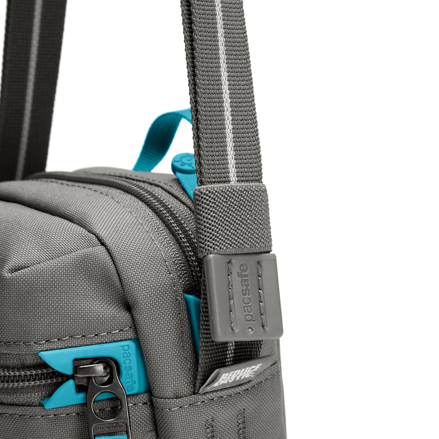 Close up of adjustable crossbody strap on stone Pacsafe® GO Anti-Theft Micro Crossbody