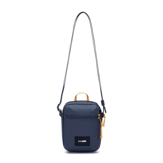 Product Image – Pacsafe® GO Anti-Theft Micro Crossbody, navy blue, recycled polyester, blue strap, front zipper pocket.