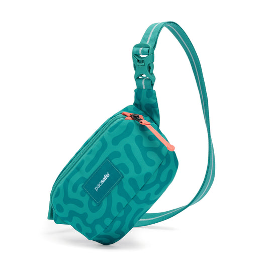Product Image – Pacsafe® GO Anti-Theft Micro Sling by Pacsafe: teal, abstract pattern, zipper, adjustable strap.