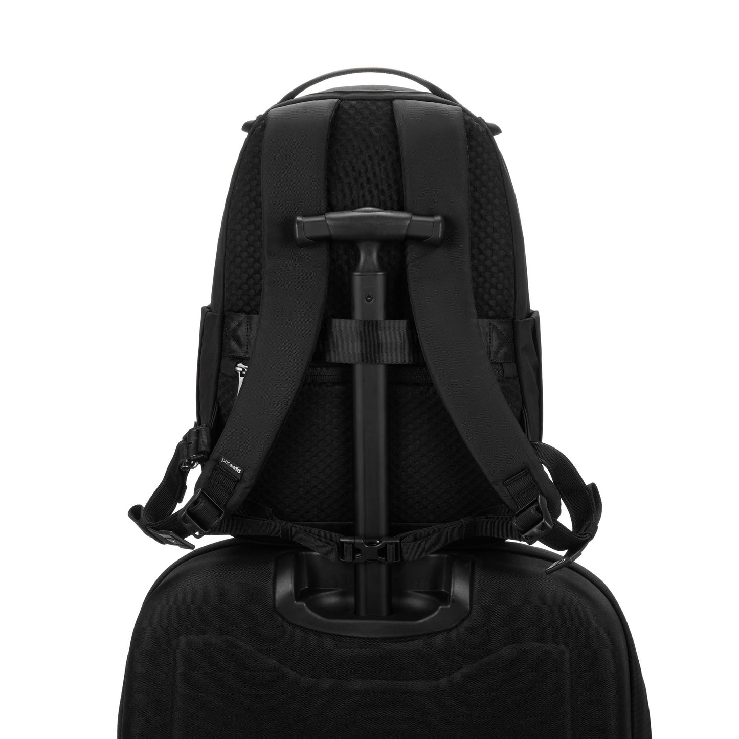 Pacsafe® V 16L Backpack: anti-theft, padded laptop sleeve, fits on suitcase handle, back view.
