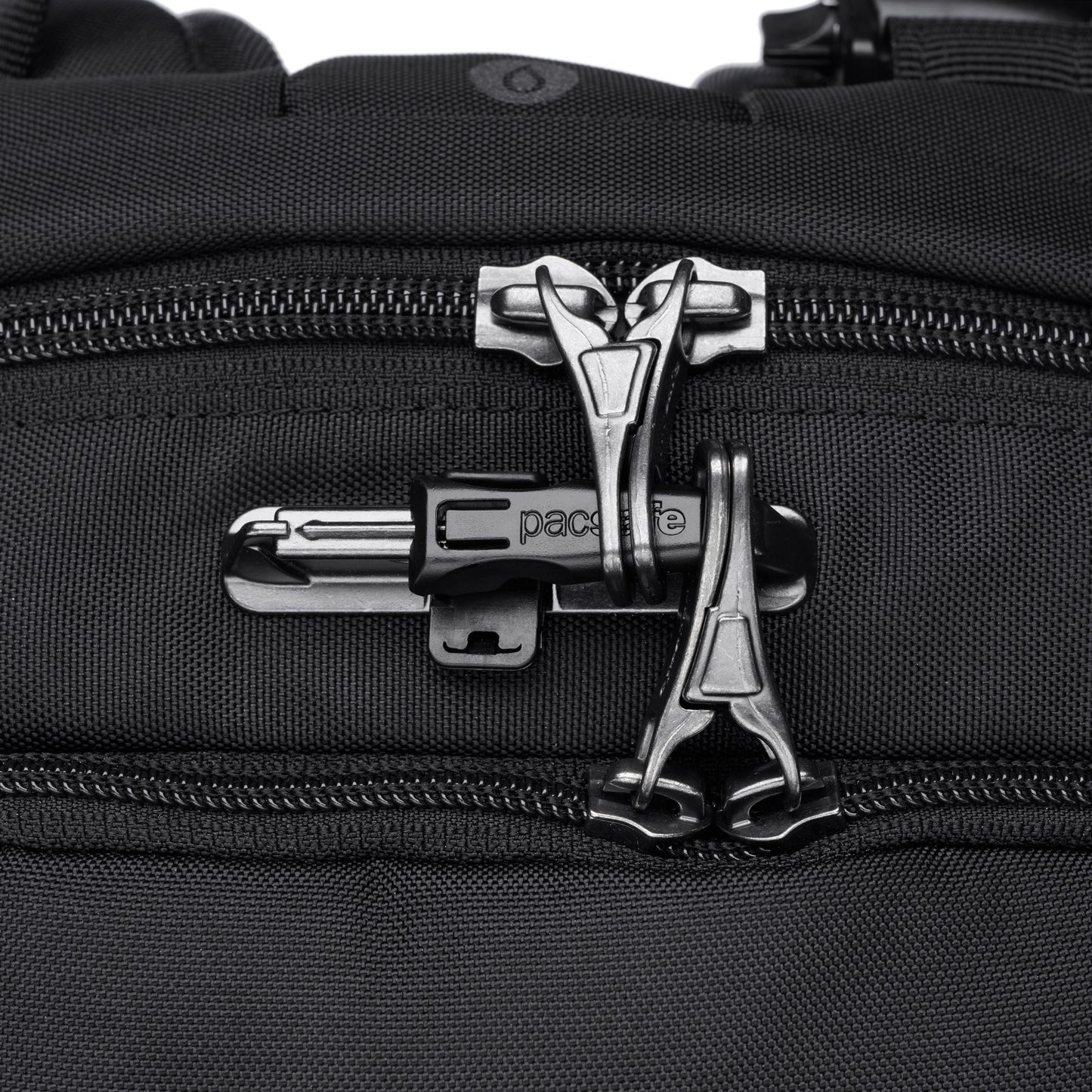 Close-up of the black Pacsafe® V 24L Anti-theft Active Backpack with silver zippers, made from recycled polyester.