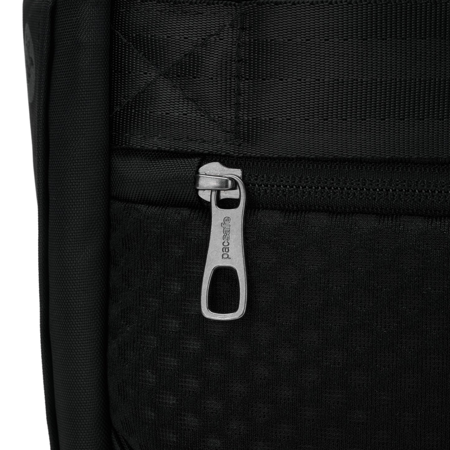 Close up of rear zippered pocket on back panel of black Pacsafe® V 26L Anti-theft Tour Backpack