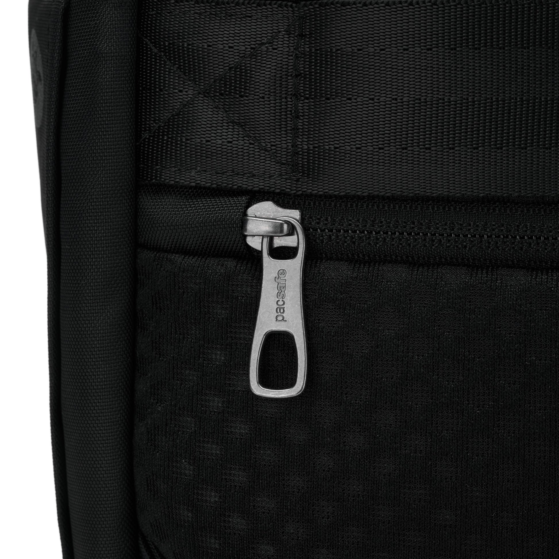 Close up of rear zippered pocket on back panel of black Pacsafe® V 26L Anti-theft Tour Backpack