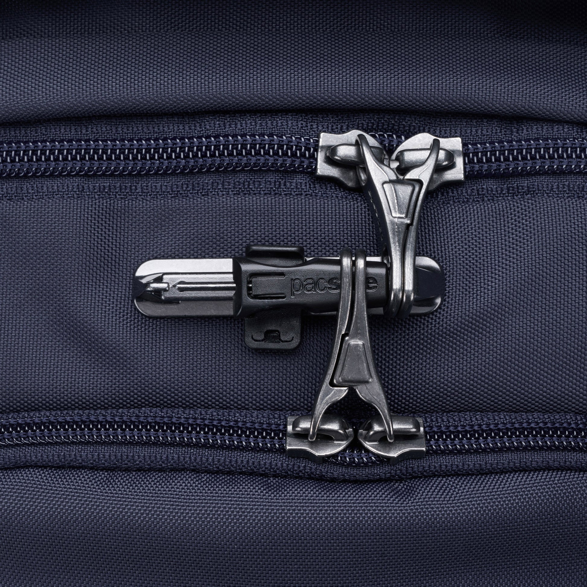 Close-up of ocean blue Pacsafe® V 26L Anti-theft Tour Backpack lockable zippers