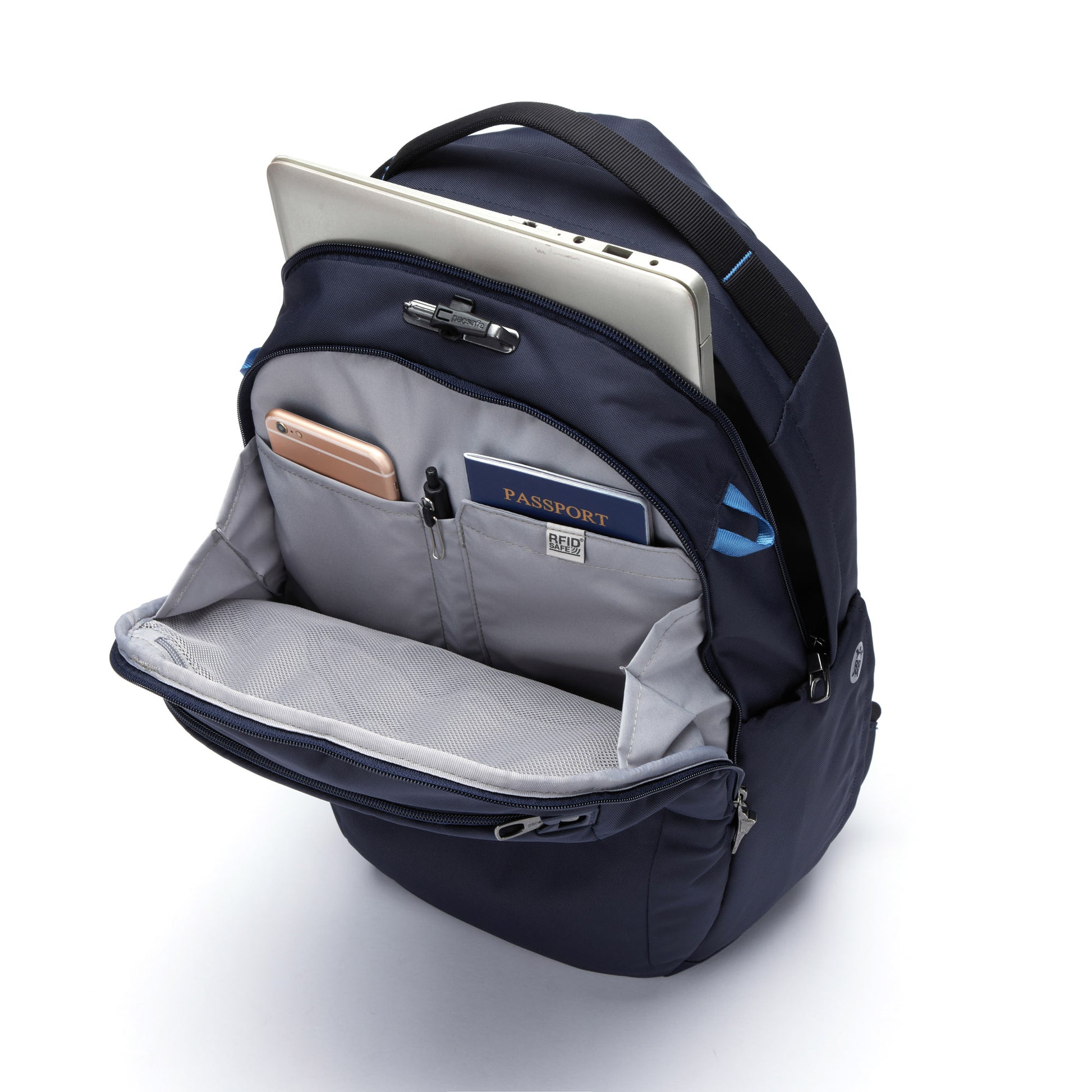 Open view of Pacsafe® V 26L Anti-theft Tour Backpack in ocean reveals a laptop, smartphone, passport, and gray compartments.