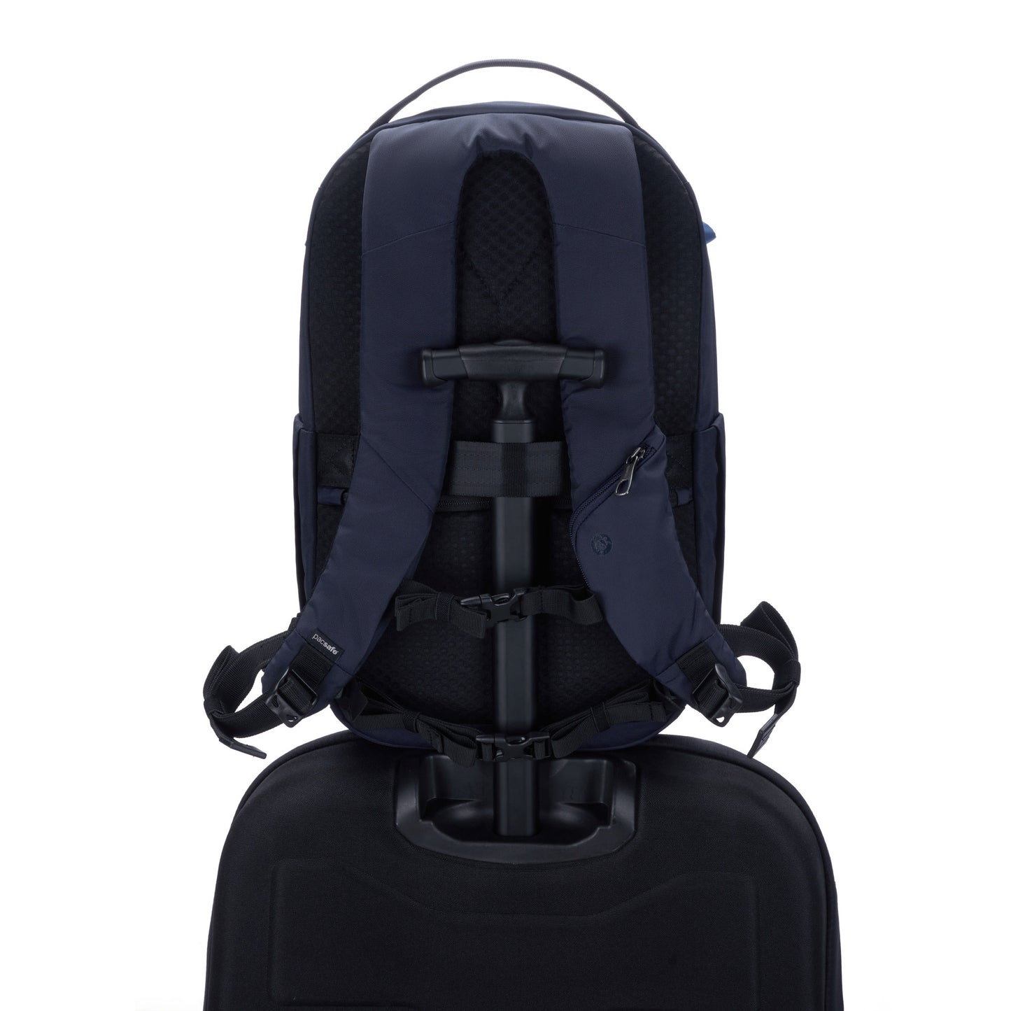 Pacsafe® V 26L Anti-theft Tour Backpack in recycled polyester, strapped to suitcase handle, seen from the rear.