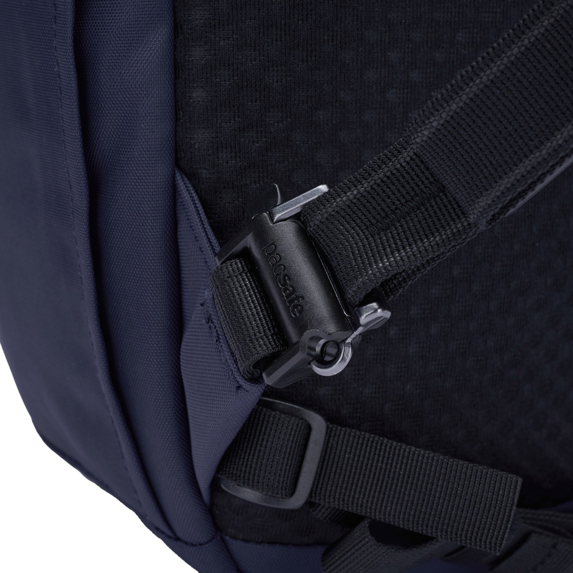 Close-up of a Pacsafe® V 26L blue anti-theft tour backpack with black buckle strap, made from recycled polyester.