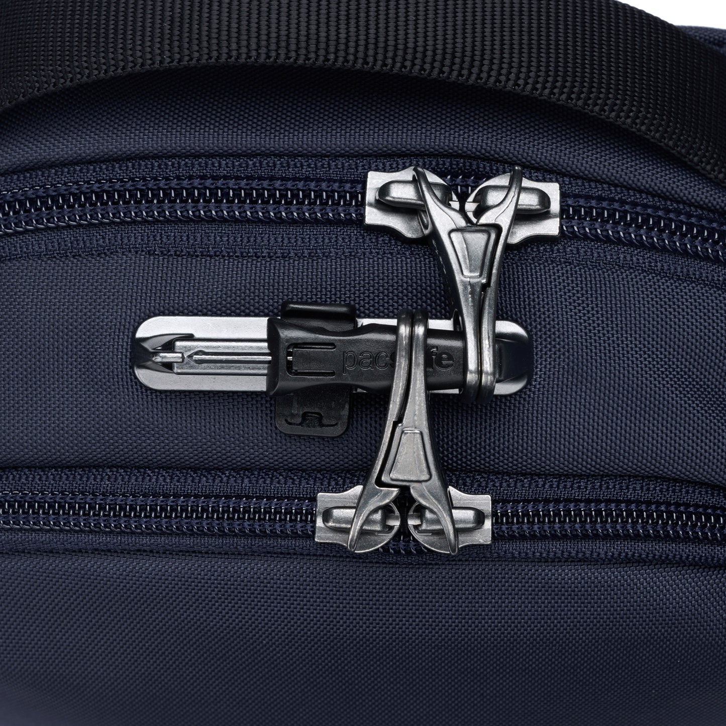 Close-up of the Pacsafe® V Anti-theft Companion Crossbody in ocean blue with a silver lock securing two zippers.