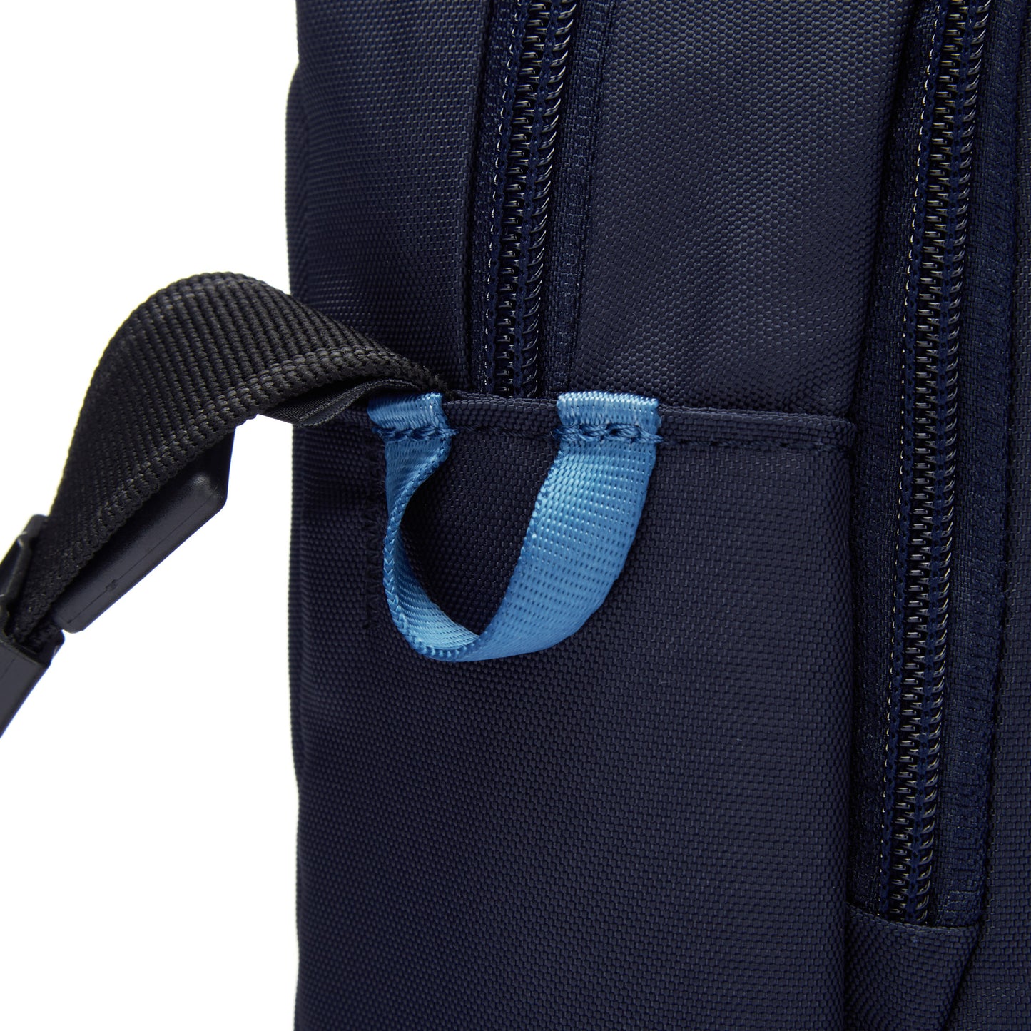 The Pacsafe® V Anti-theft Companion Crossbody in ocean blue features a light blue loop, black strap, and is water-repellent.