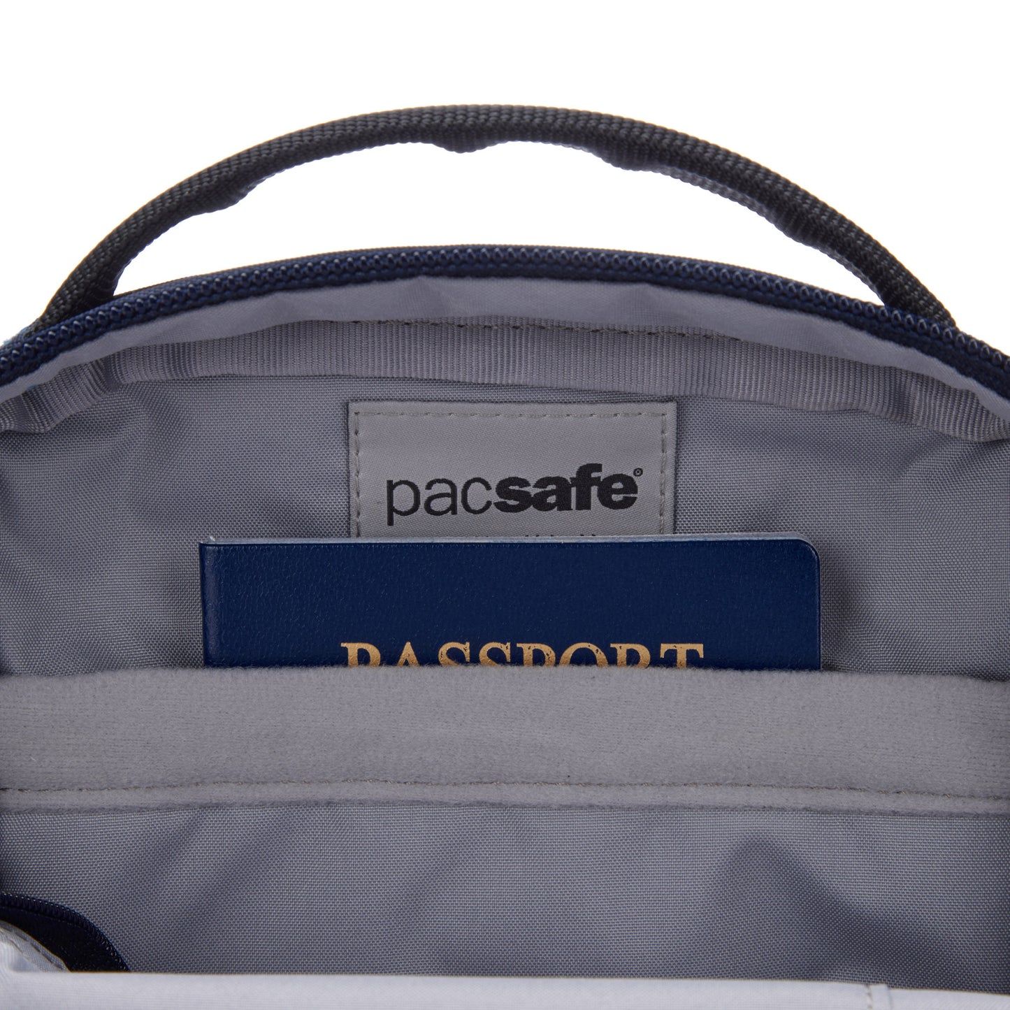 A passport peeks from Pacsafe® V Anti-theft Companion Crossbody, highlighting its secure design.