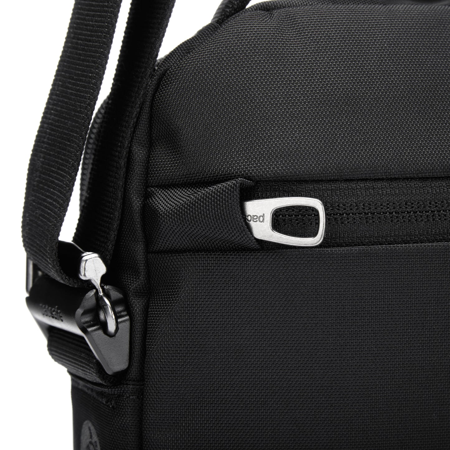 Pacsafe® V Anti-theft Tour Crossbody: Black with zipper, metal clip, and lockable compartments.