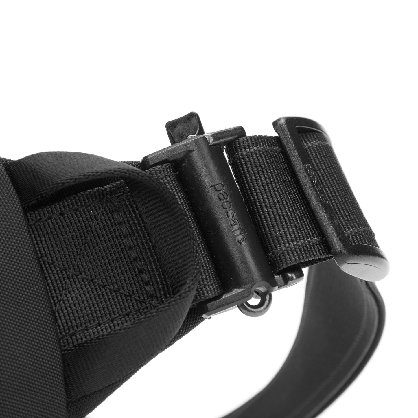 Close-up of a black buckle and strap on the Pacsafe® V Anti-theft Urban Sling, logo embossed on the clasp.