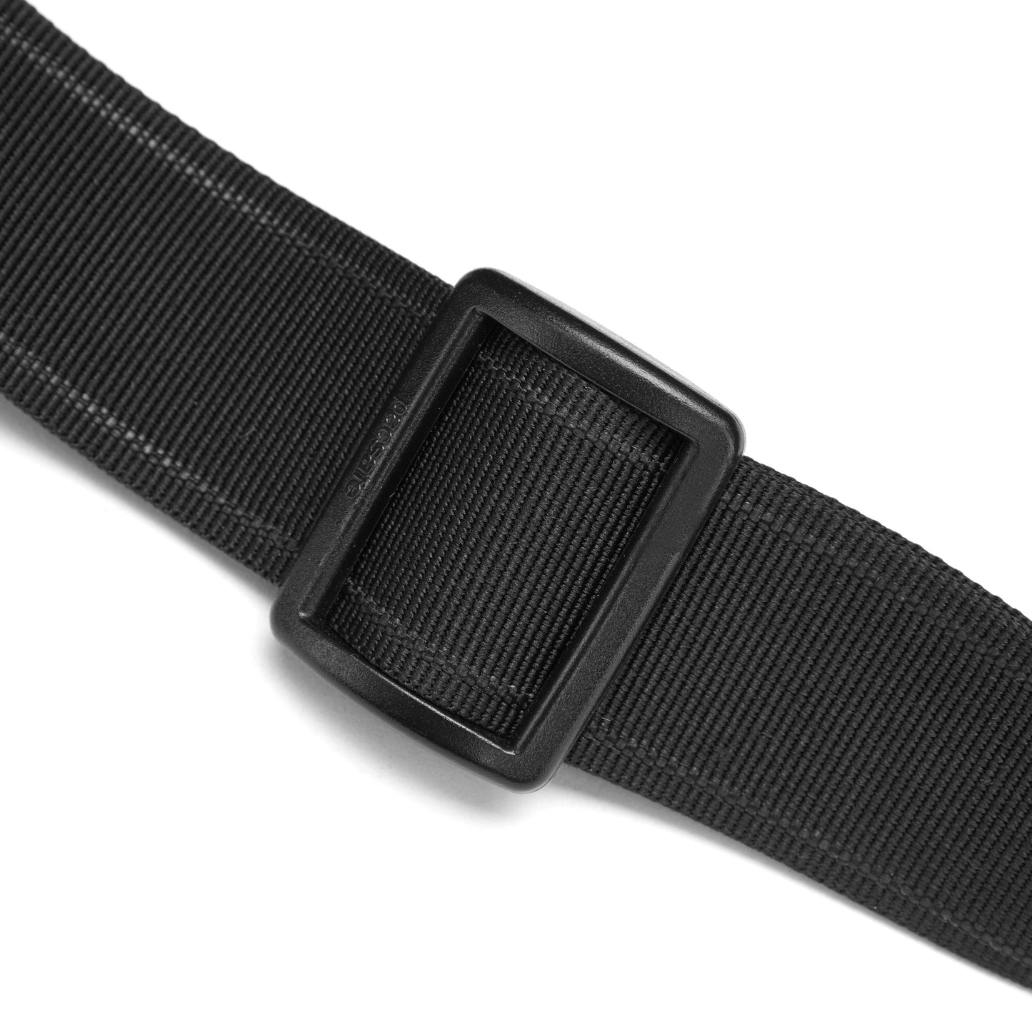 Close-up of the Pacsafe® V Anti-theft Urban Sling’s black nylon strap with a plastic buckle against a white background.