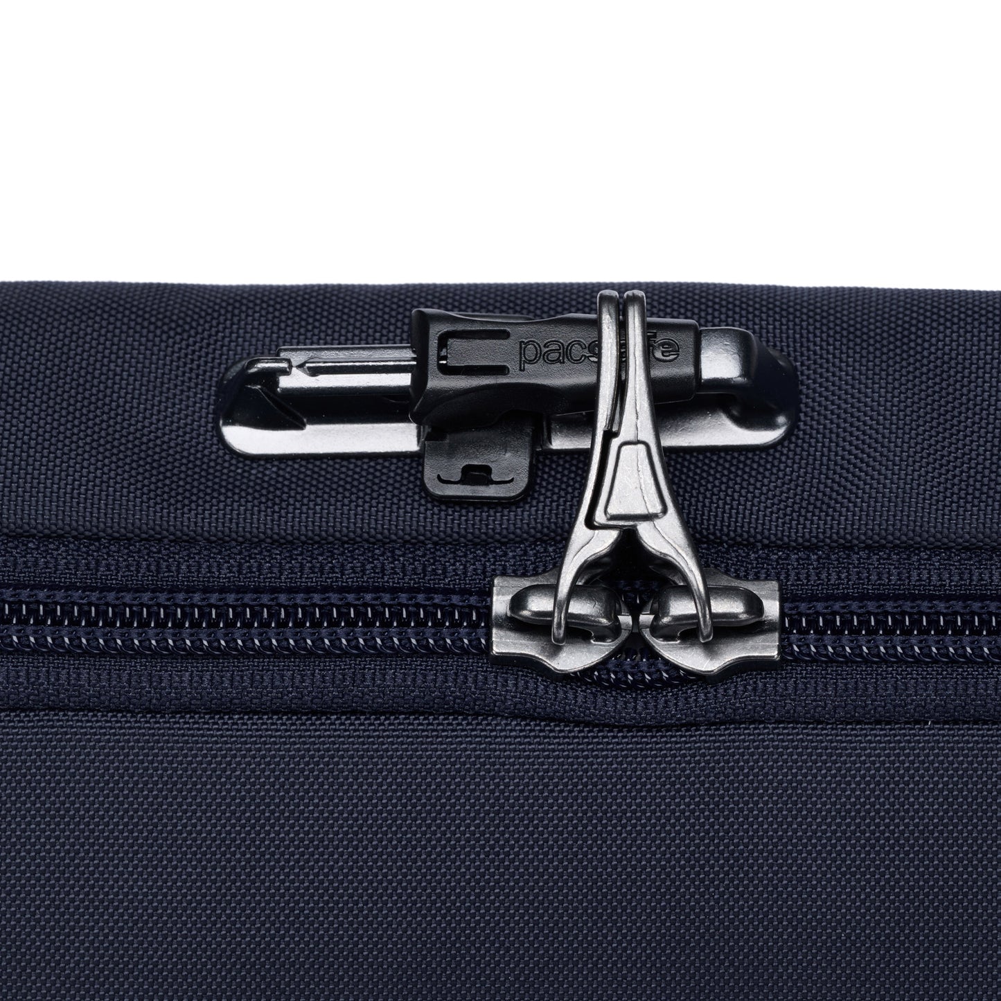 Black zipper on ocean blue fabric background of Pacsafe® V Anti-theft Urban Sling by Pacsafe.