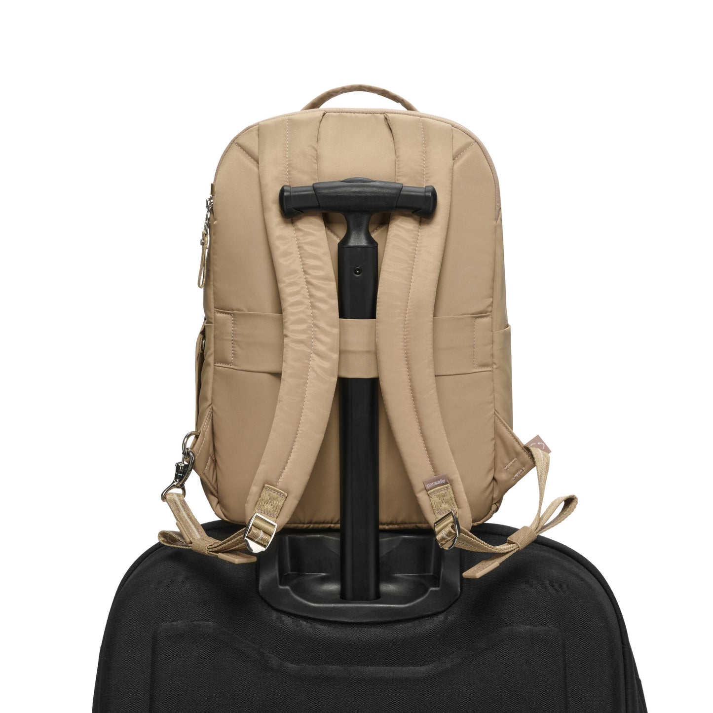 The Pacsafe® W 10L Anti-theft Backpack in recycled polyester secures to a suitcase handle.