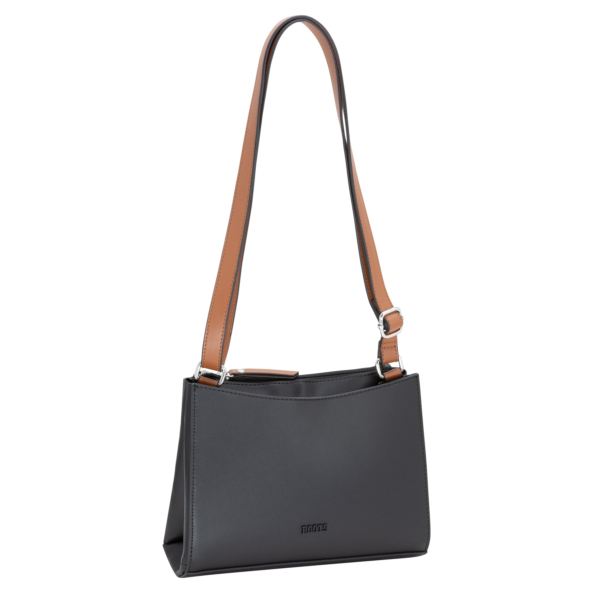 Roots rectangular crossbody bag with tan adjustable strap and silver accents.