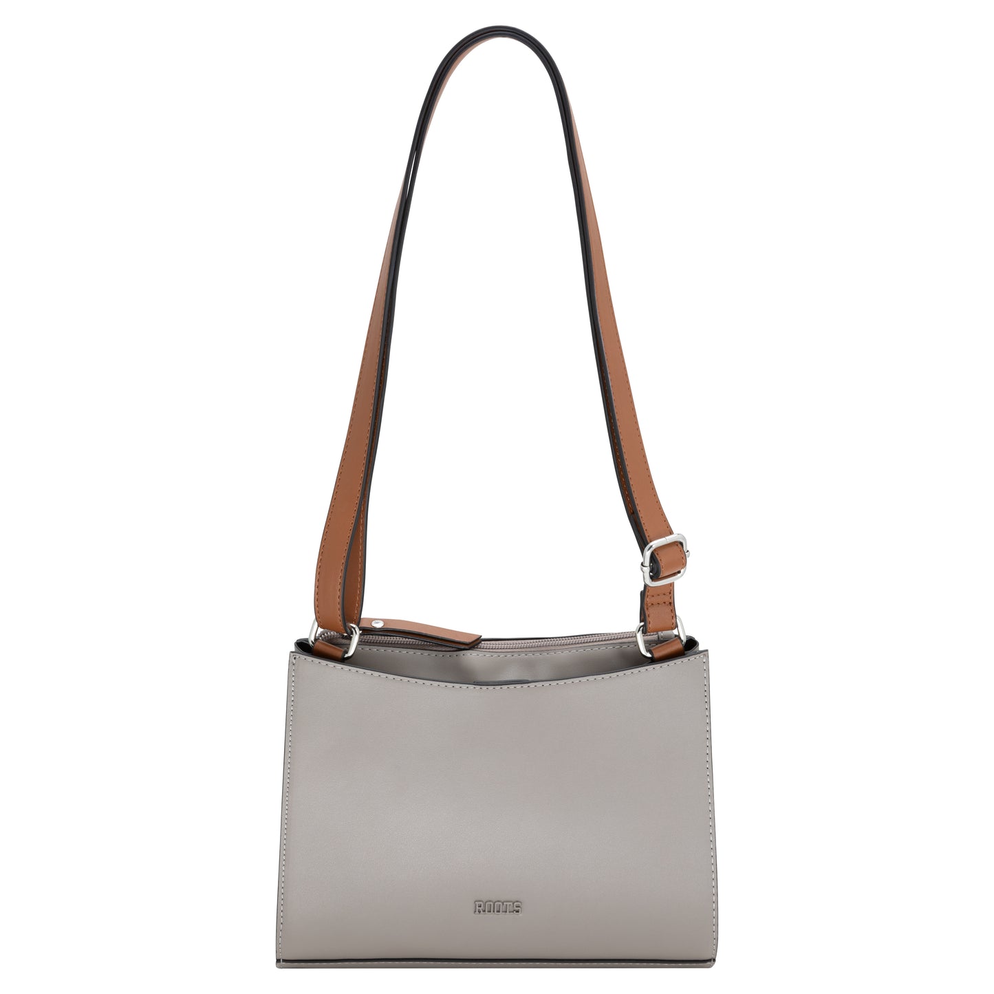 Roots Crossbody taupe with front pocket: brown adjustable strap, and small front logo.