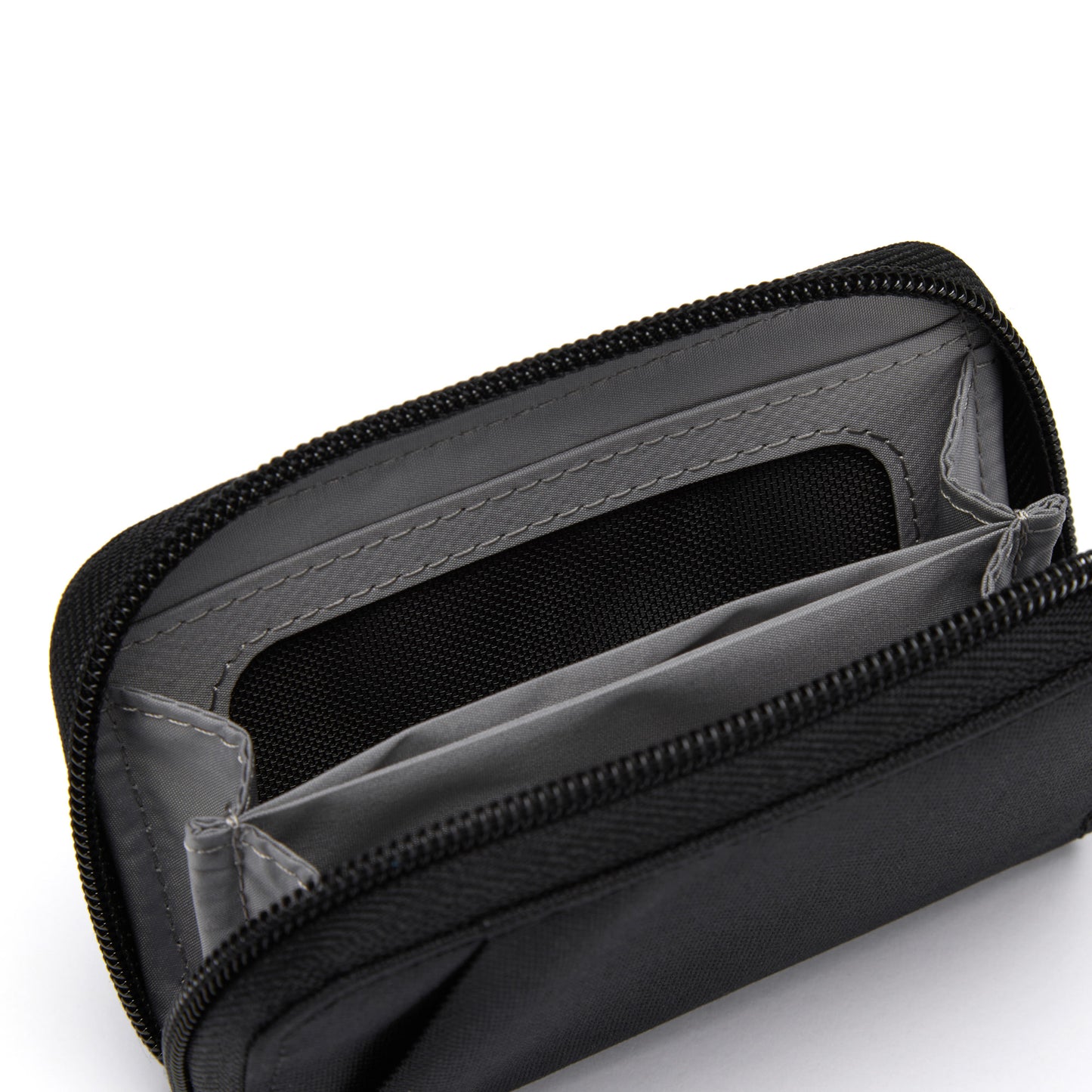Pacsafe® RFIDsafe™ card wallet by Pacsafe, with empty slots and zippered closure, made from recycled polyester.
