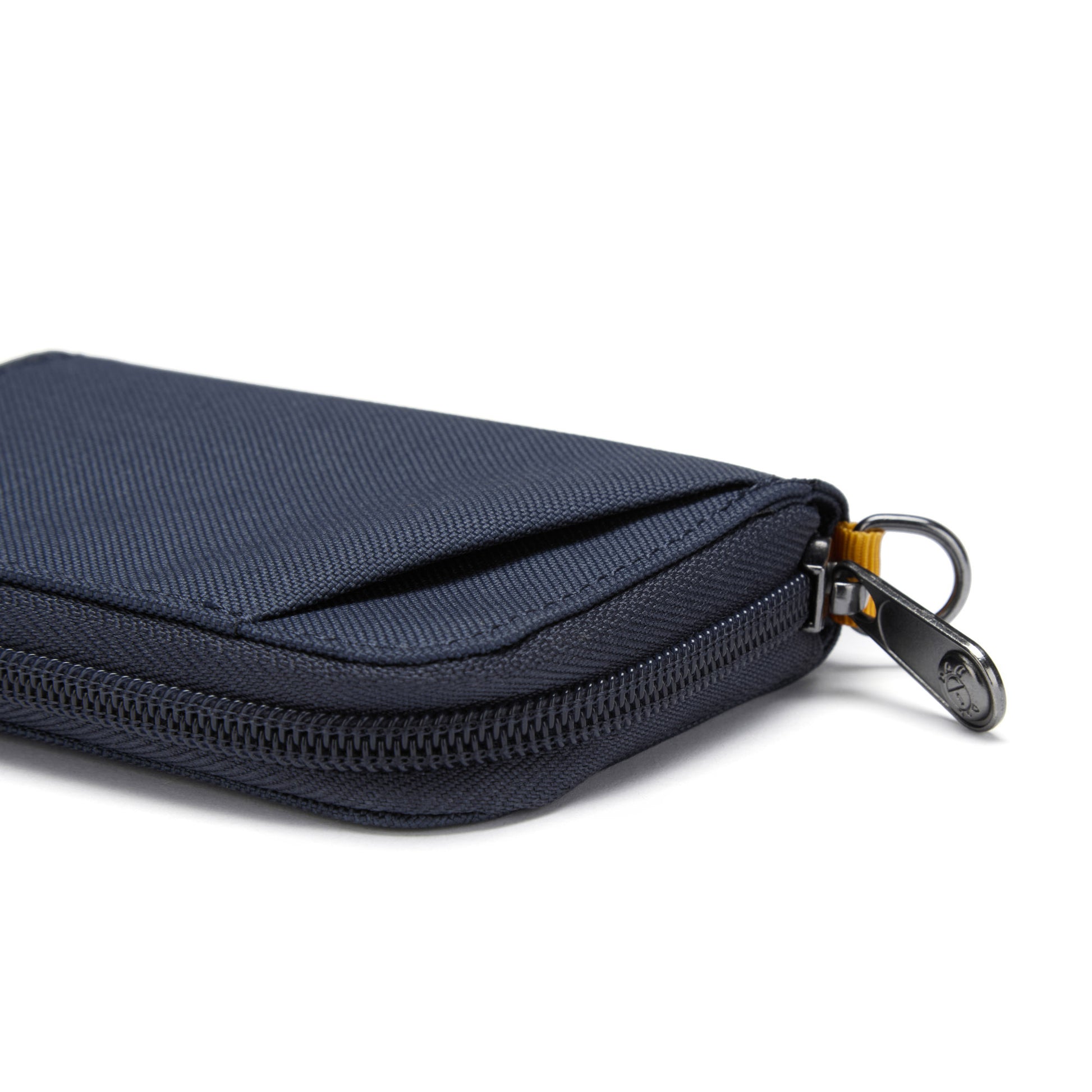 Pacsafe® RFIDsafe™ card wallet, coastal blue, close up of zipper