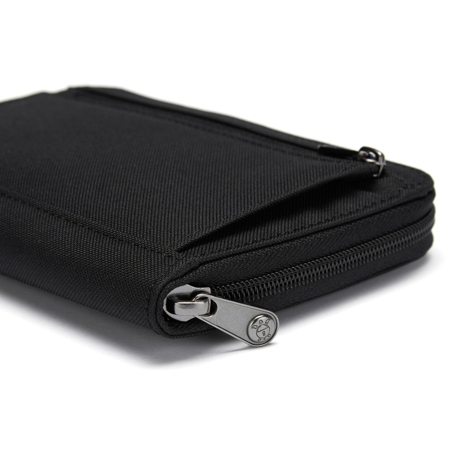 Black Pacsafe® RFIDsafe™ pouch made from recycled polyester with textured material and small metal zipper pull.