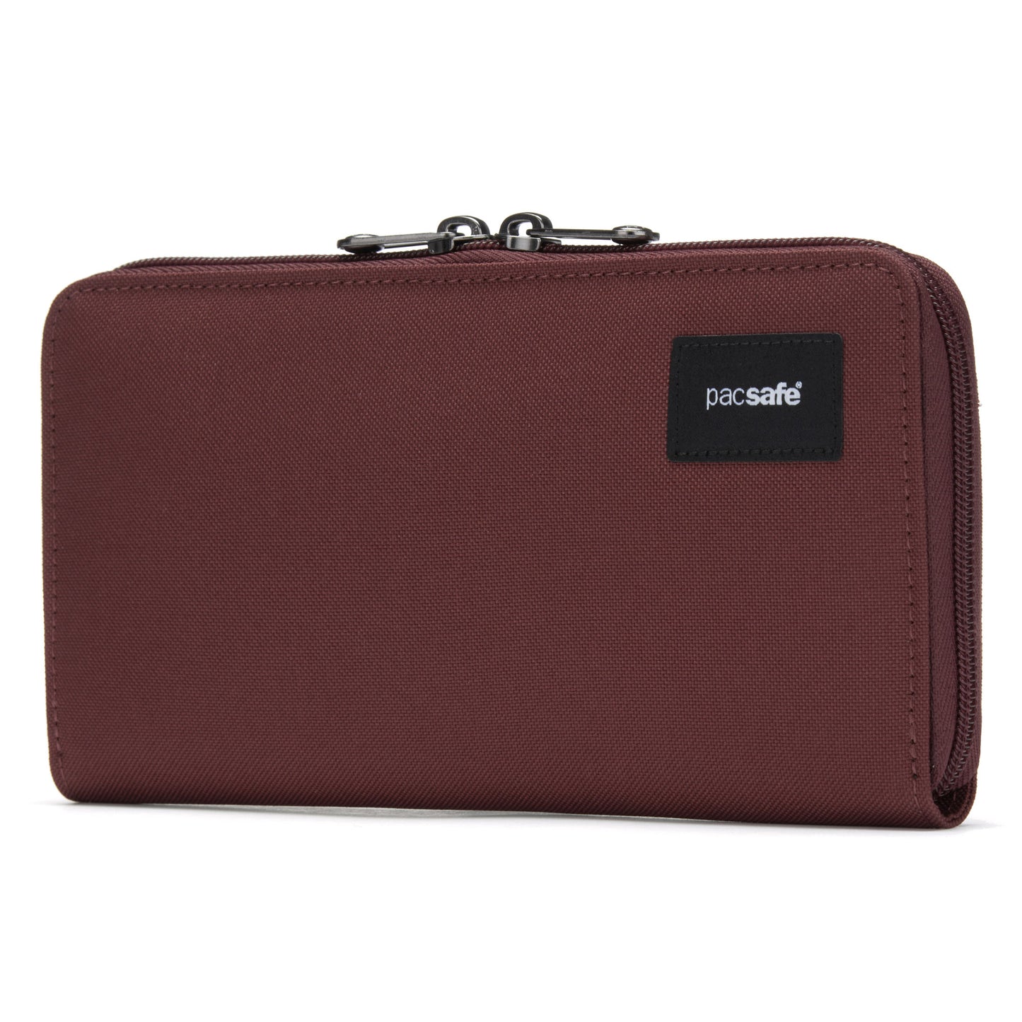 A garnet red RFID-blocking wallet with a zipper and black Pacsafe® logo patch.