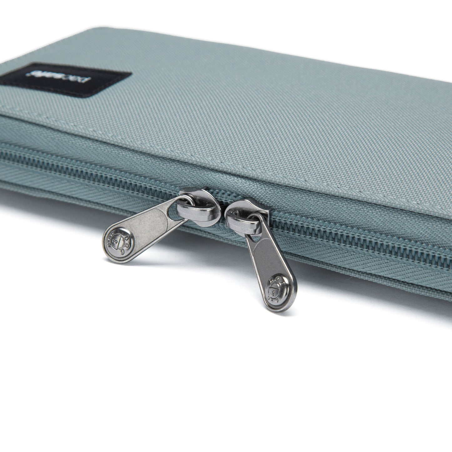 Pacsafe® RFIDsafe™ RFID Blocking Continental Wallet in fresh mint with dual zippers.