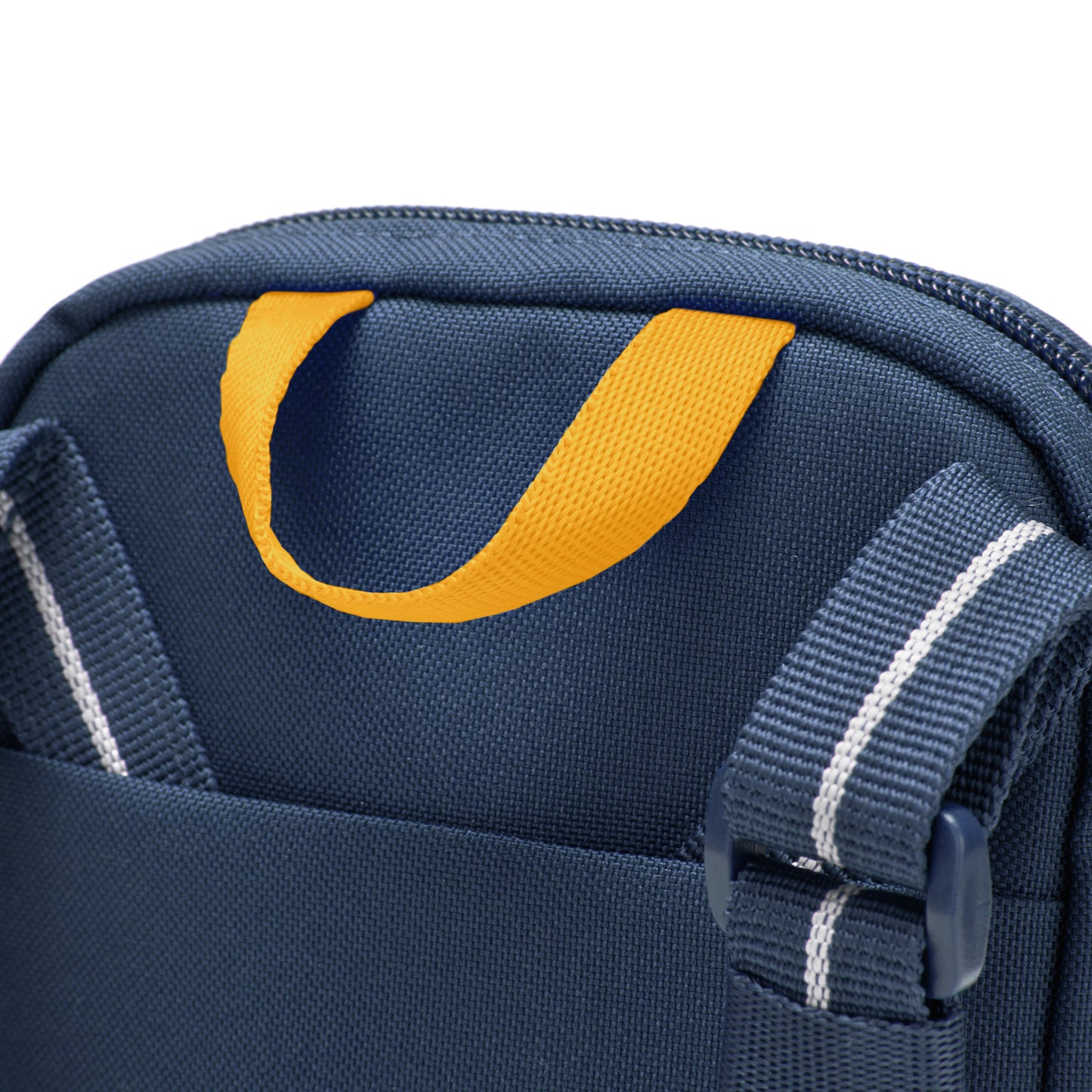 Close-up of the Pacsafe® RFIDsafe™ Tech Crossbody in blue fabric with a yellow handle and adjustable straps.