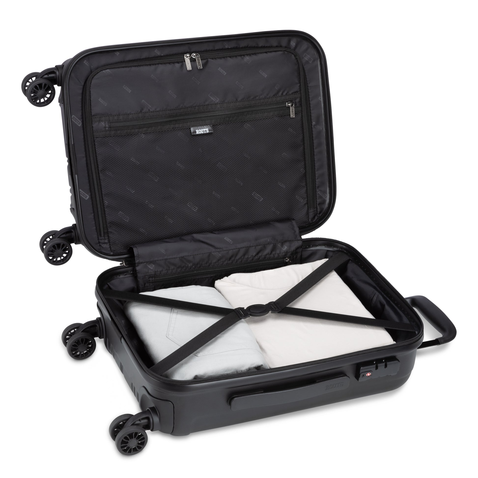 Roots Identity 19" Hardside Spinner Carry-on, black, open view with clothes packed inside
