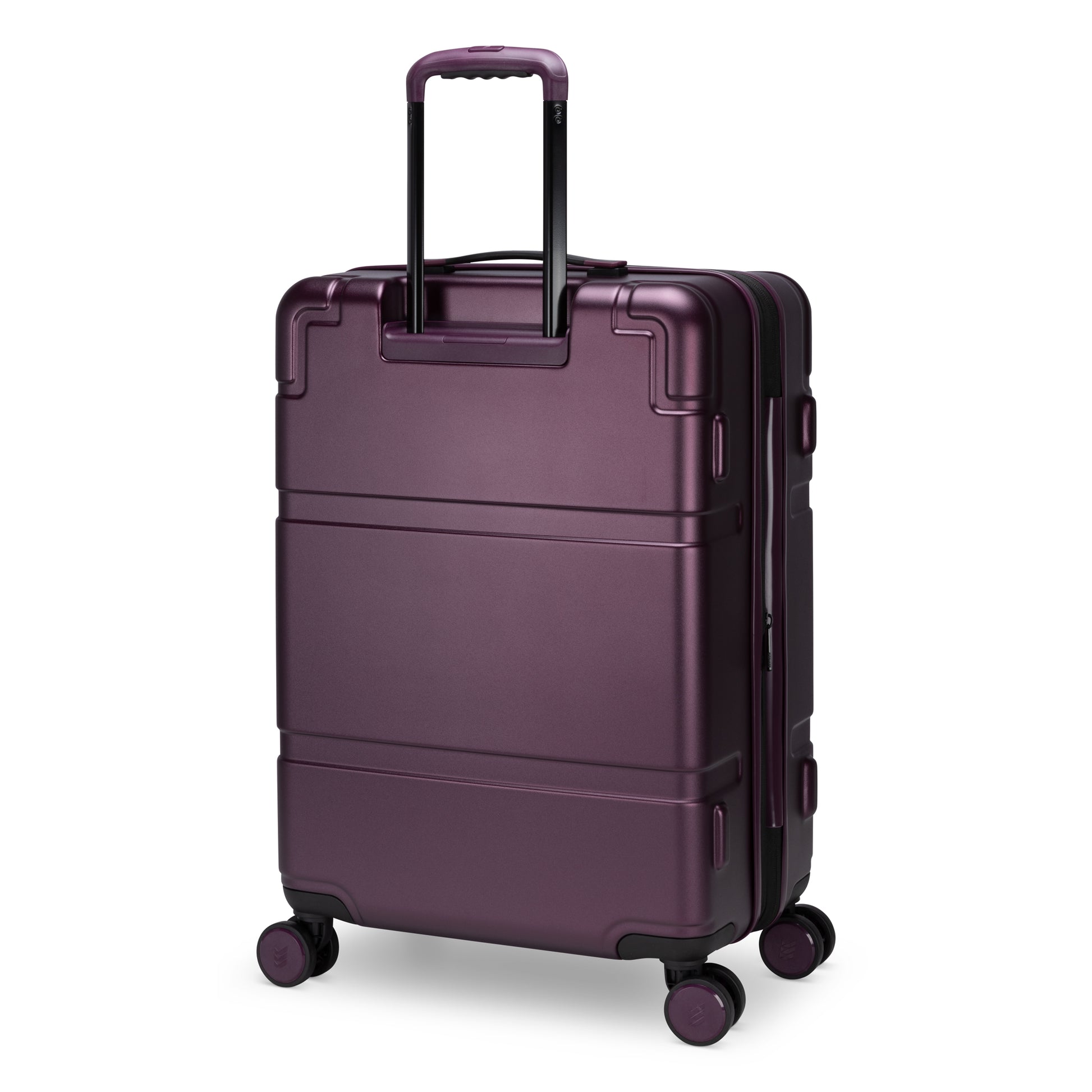 Travelite Itinerary Medium Expandable Hardside Spinner in fig purple with four 360-degree wheels and an extended handle.
