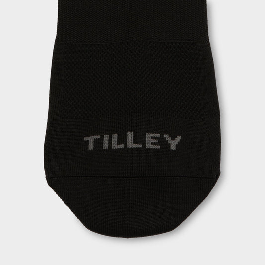 Product Image – Close-up of the Tilley Ankle Travel Sock - ONLINE ONLY, showing "TILLEY" in gray on the black toe.