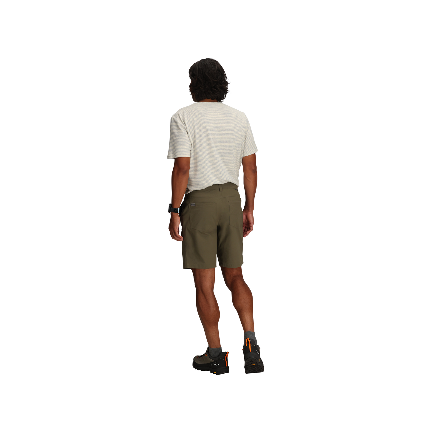 Man facing away in light tee, Royal Robbins Men's Wilder Short, black boots, watch; white background.