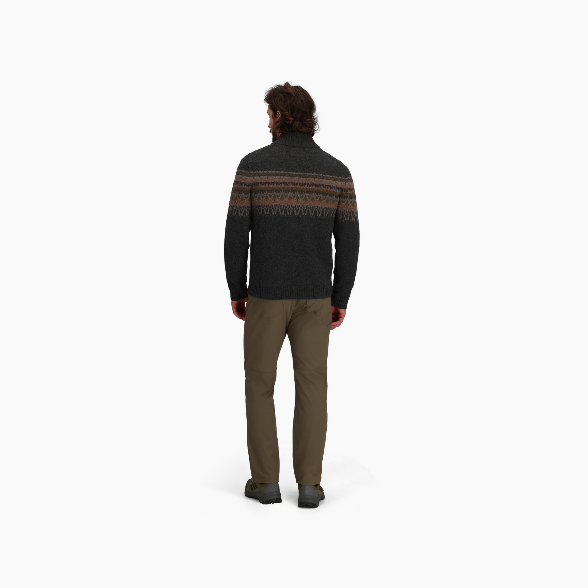 Man wears Royal Robbins Men's Arch Rock 1/4 Zip sweater, khaki pants, and gray shoes against a white background.