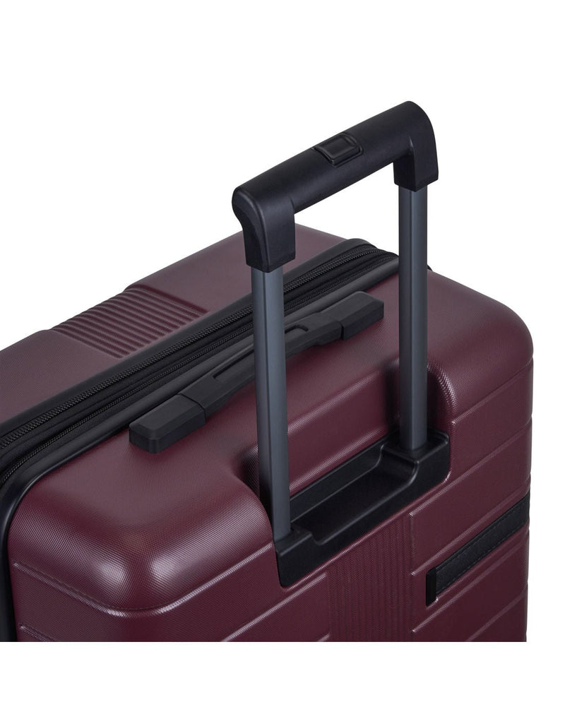 Bugatti Hamburg Hardside Carry-on Spinner in Red Lacquer colour, close-up view of the extended telescopic trolley handle.
