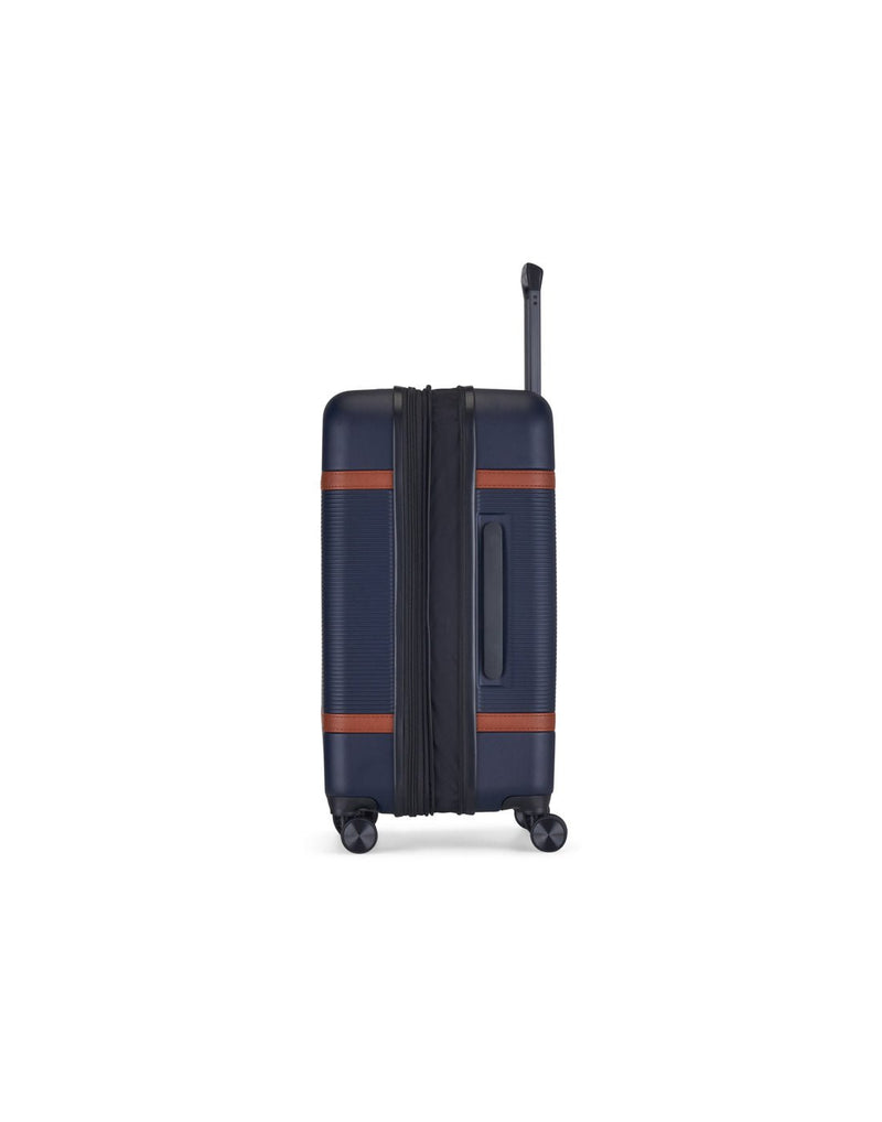 Bugatti Wellington Hardside 24" Expandable Spinner in Navy, side view with zipper-release expansion system.