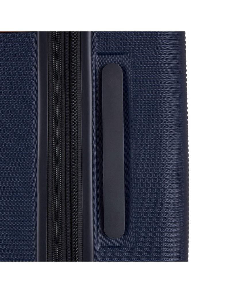 Bugatti Wellington Hardside 28" Expandable Spinner in Navy, close-up view of the side handle.